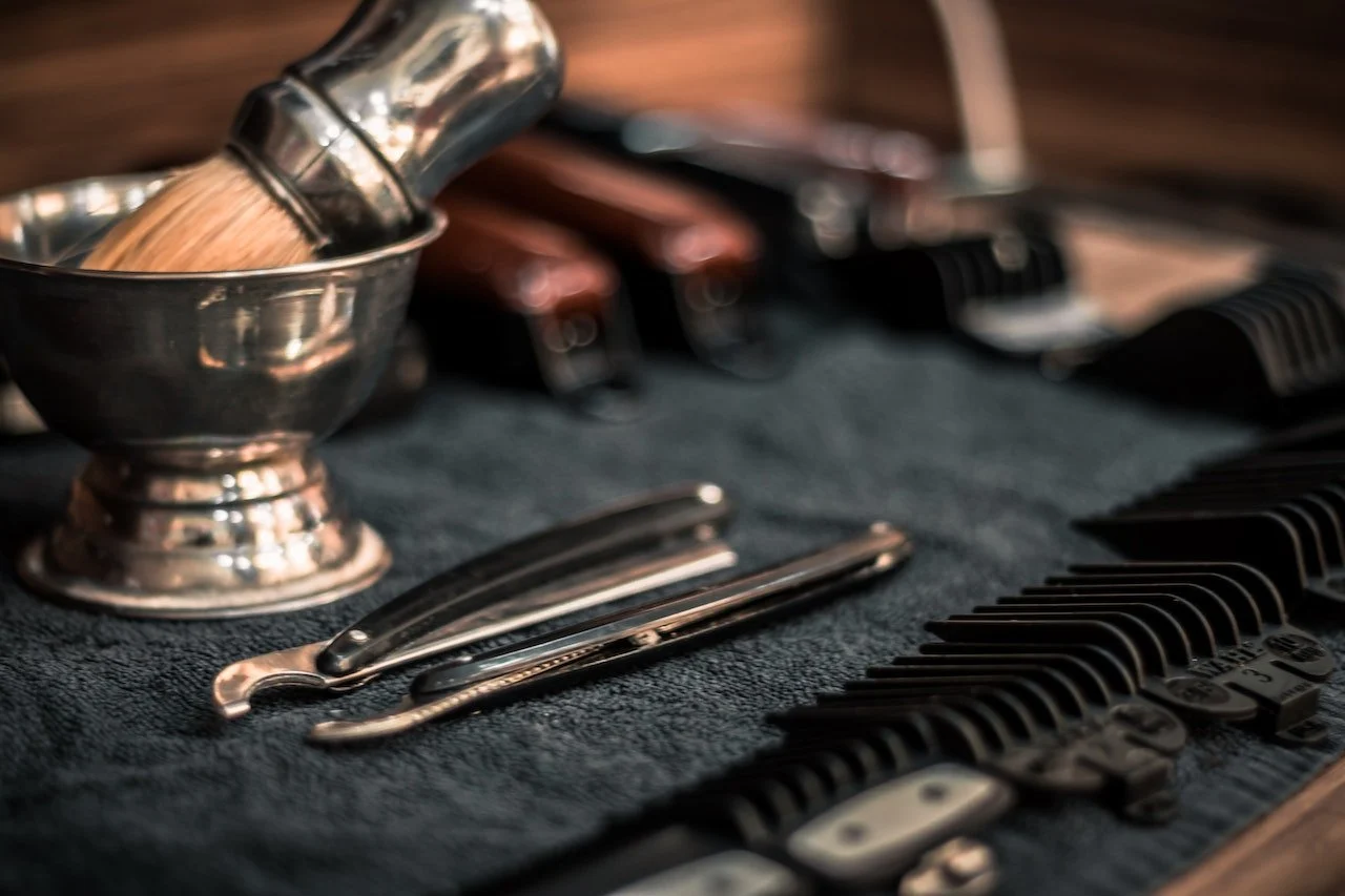 Traditional shaving brush and barber tools.